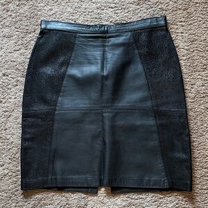 Vera Pelle Black Italian Leather Mini Skirt with leather texture panels.